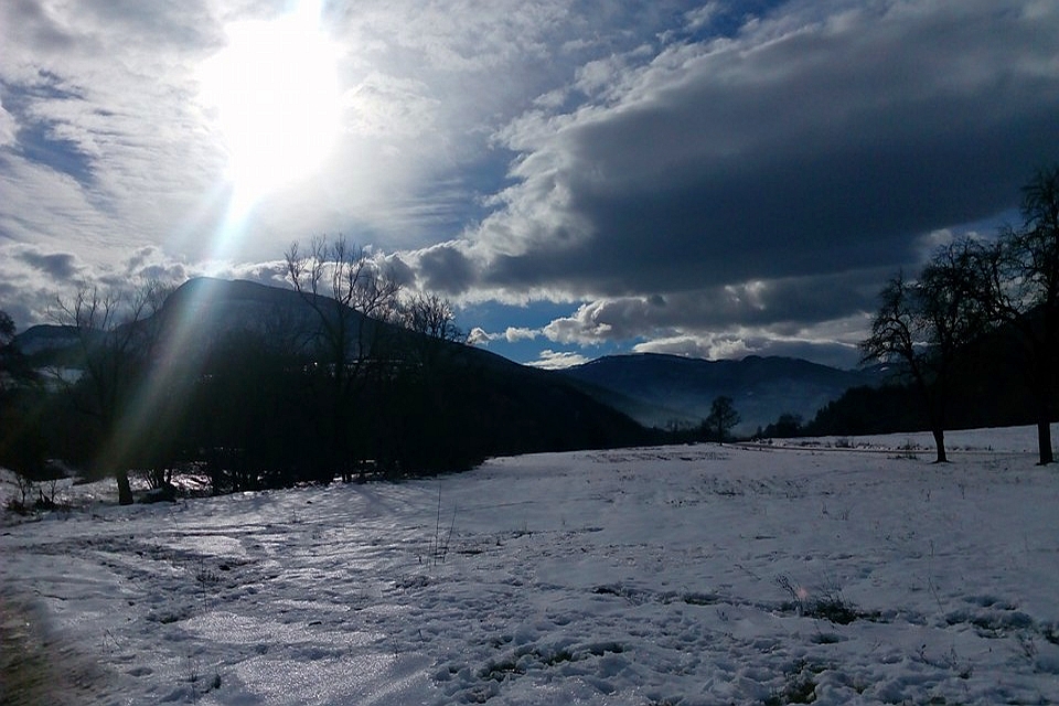 Sun Shining Through Clouds