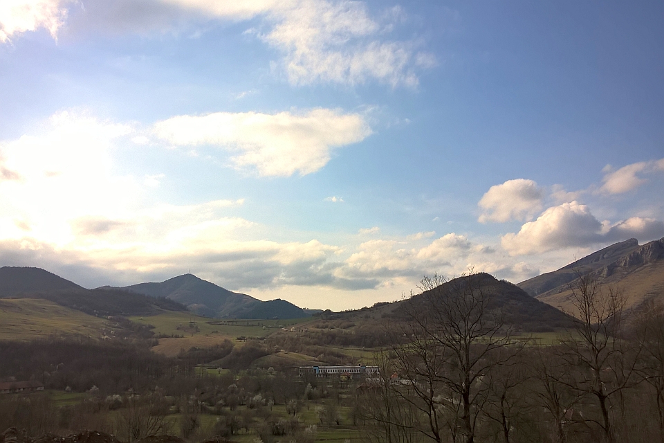 Valley Nestled Between Rolling Hills
