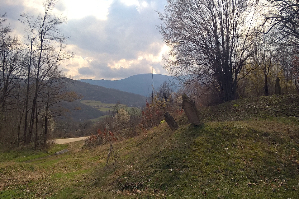 Hillside Graveyard Overlooks A Valley