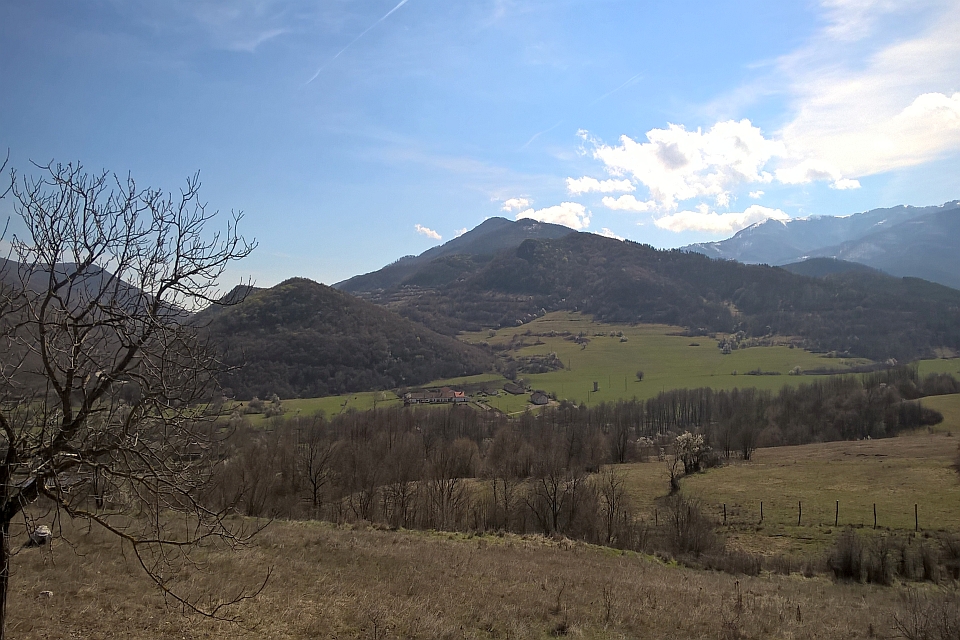 Mountainous Landscape Under A Partly Cloudy Sky