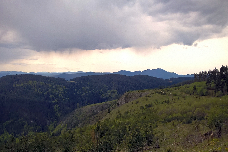 Mountain Range Under A Cloudy Sky