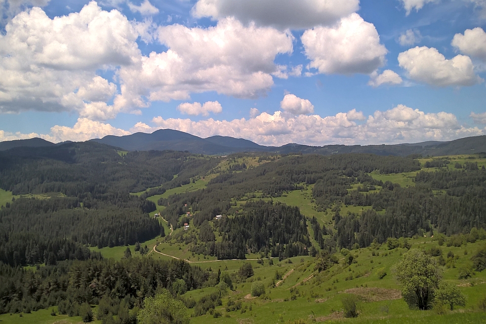 Rolling Green Hills And Mountains