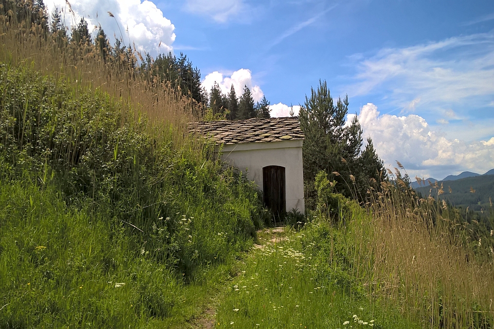 White Building With A Stone Roof