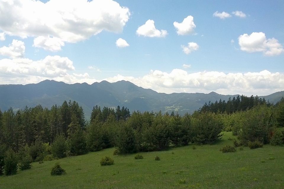 Mountain Range Under A Partly Cloudy Sky
