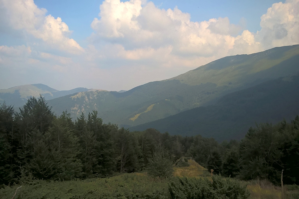 Mountain Range Under A Partly Cloudy Sky