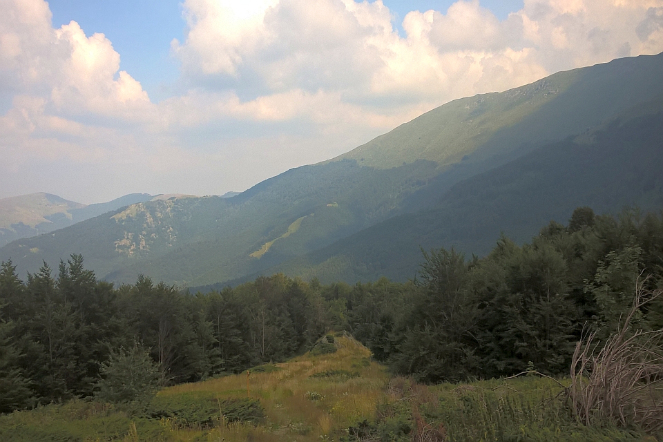 Mountain Range Under A Partly Cloudy Sky