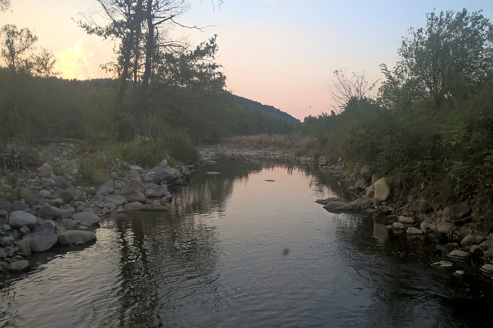Calm River At Sunset