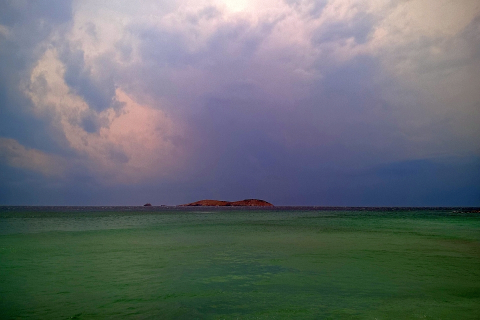 Small Island In A Calm Sea