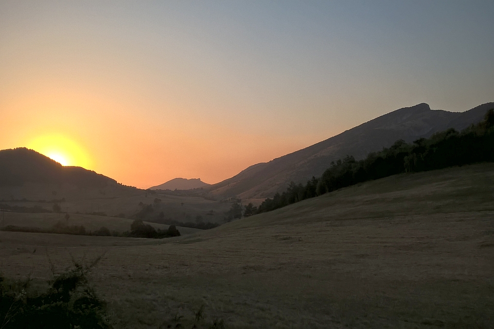 Sunset Over Rolling Hills