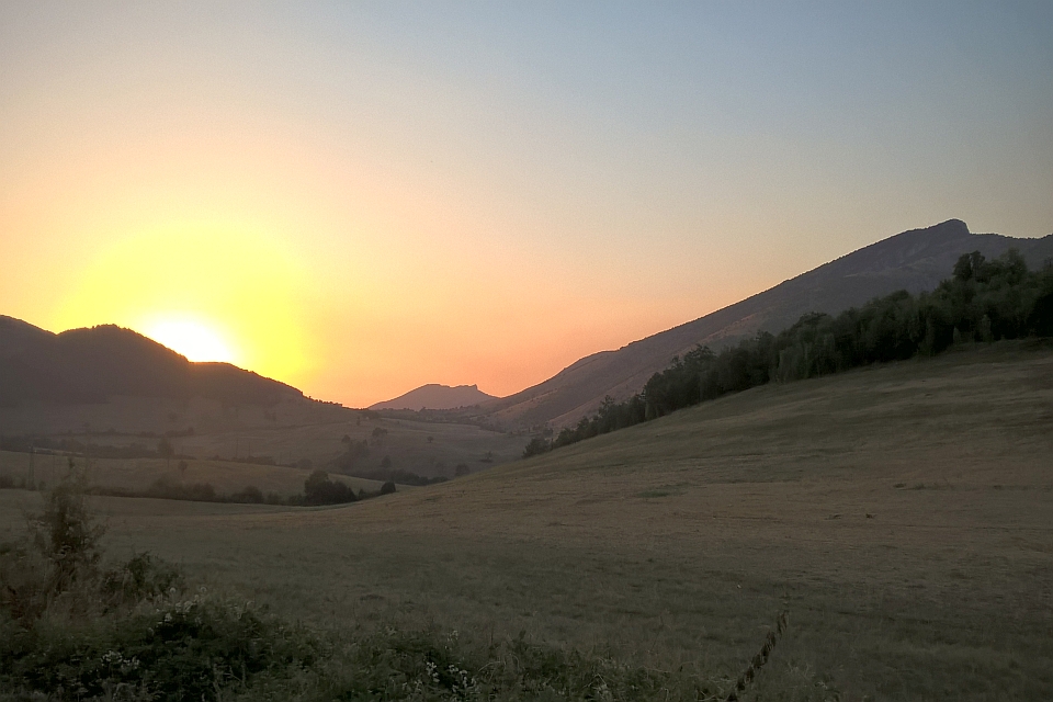 Sunset Over Rolling Hills