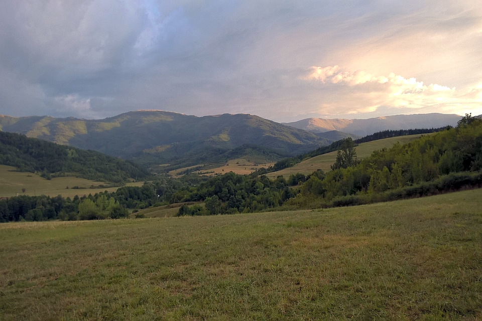 Rolling Green Hills And Mountains