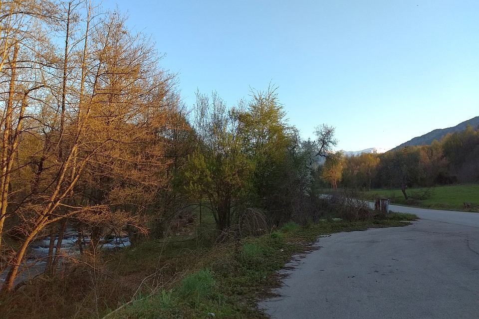 Paved Road Winds Through A Landscape