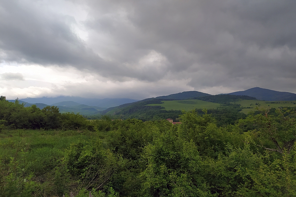 Rolling Green Hills And Mountains